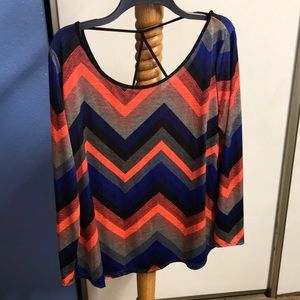 Long sleeve top with a boat neck and open back